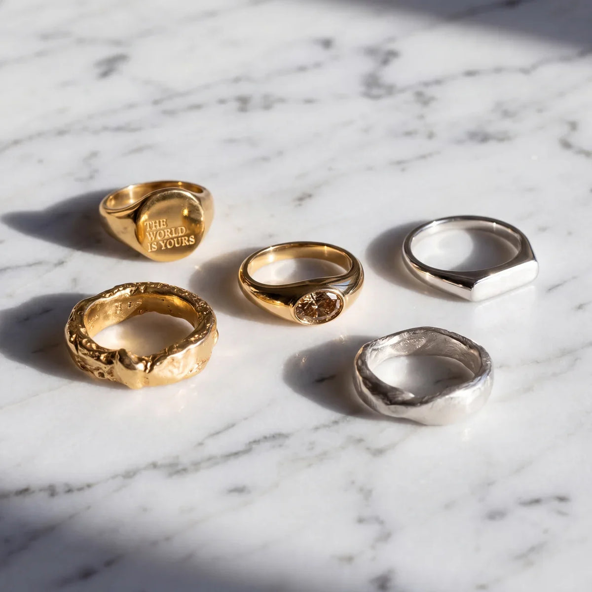signet ring uk styles flat lay marble