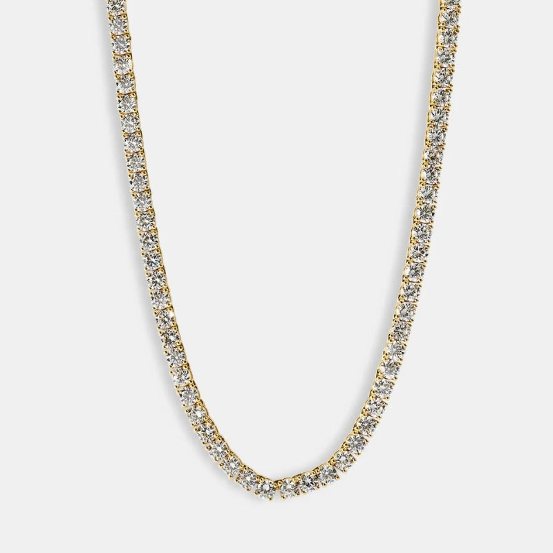 gold tennis chain men flat lay